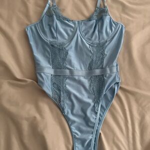 Sleek Blue Satin Bodysuit with Lace Accents